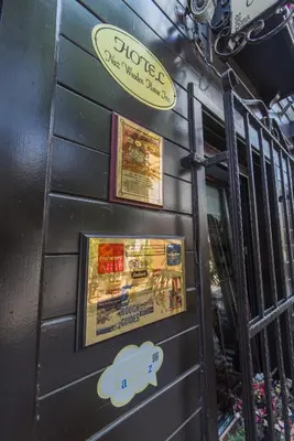 a food truck with signs on the side of it at Naz Wooden House Inn in Istanbul