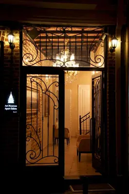 a room with a door open to a bedroom with a bed at Art Nouveau Galata in Istanbul