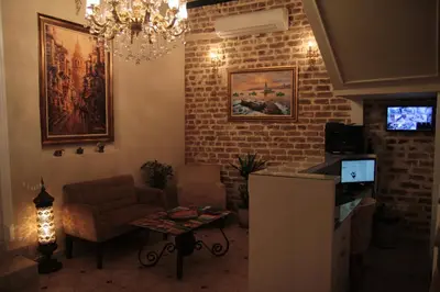 a living room with a couch and a table at Art Nouveau Galata in Istanbul