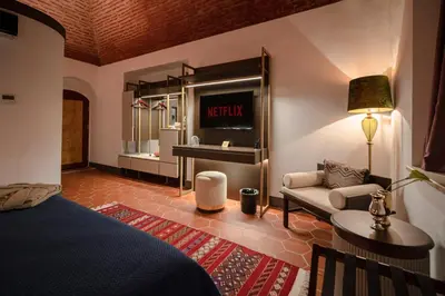 a hotel room with a bed and a mirror at Han 1772 Hotel in Istanbul