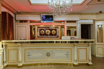 a bar in a room with a chandelier at Hotel Ipek Palas in Istanbul