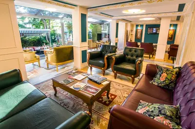 a living room with couches and chairs and a table at Garden House Hotel - Special Class in Istanbul