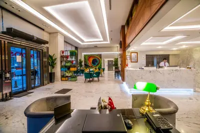 an office with a reception desk and a lobby at Erboy Hotel Istanbul Sirkeci in Istanbul