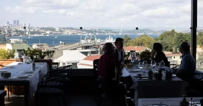 a group of people sitting at tables in a restaurant at Orient Express & Spa by Orka Hotels in Istanbul