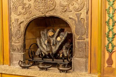 a stone fireplace with a bunch of meat in it at Hotel Sultanhan - Special Category in Istanbul
