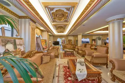 a living room filled with furniture and a ceiling at Golden Horn Hotel in Istanbul