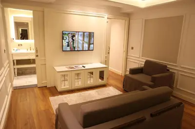 a living room with a couch and a chair at Mina Hotel - Special Category in Istanbul