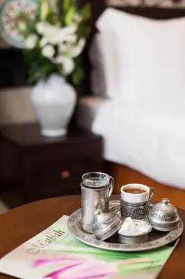 a tray with two cups of coffee on a table at Ottoman Hotel Imperial-Special Category in Istanbul