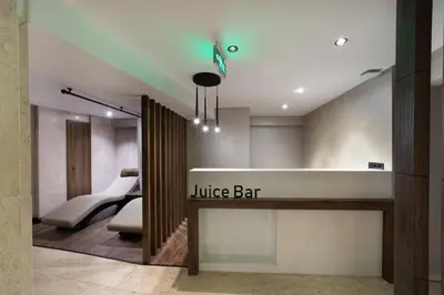 a lobby with a juute bar sign on the wall at Orka Royal Hotel & Spa in Istanbul