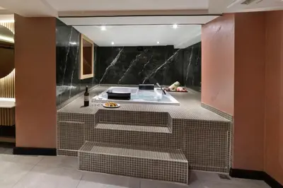 a kitchen with a bath tub in a room at Orka Royal Hotel & Spa in Istanbul