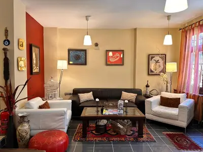 a living room with a couch and a table at Ahmet Efendi Evi in Istanbul