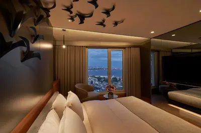 a bedroom with a large bed with bats on the ceiling at Richmond Istanbul in Istanbul
