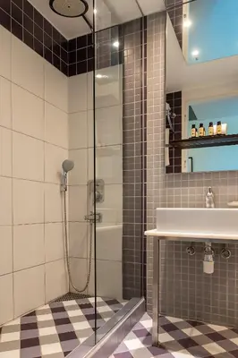 a bathroom with a shower and a sink at The Marmara Pera in Istanbul