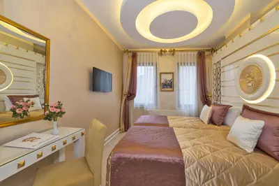 a bedroom with a large bed and a mirror at The Million Stone Hotel - Special Category in Istanbul
