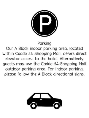a car parking sign with a car parked at Hotel54 in Sakarya