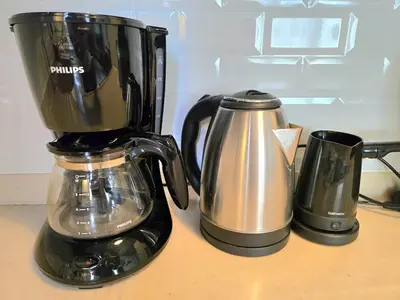 a blender and a coffee pot on a counter at Osmanbey sweet homes in Istanbul