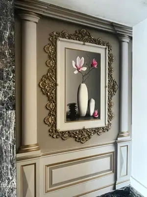 a picture of a vase with flowers on a wall at Cetin Port Hotel in Istanbul