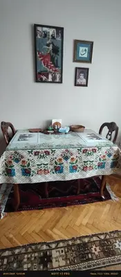 a table with a quilt on it in a room at Nur home 2 in Istanbul