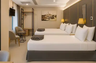 two beds in a hotel room with a room at Imagine Istanbul - Sultanahmet in Istanbul