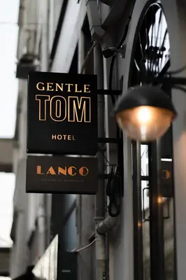 a sign for a hotel on the side of a building at GentleTom in Istanbul