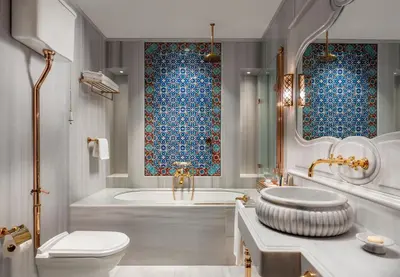 a bathroom with a tub and a toilet and a sink at AJWA Sultanahmet - Preferred Hotels LVX Collection in Istanbul