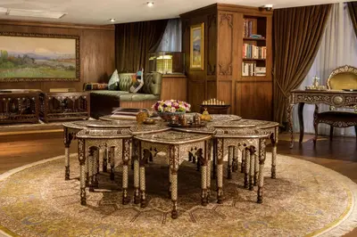 a living room with a table and a couch at AJWA Sultanahmet - Preferred Hotels LVX Collection in Istanbul
