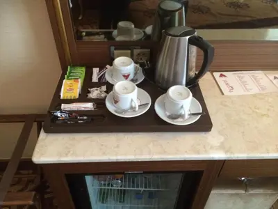 a tray with two cups and a coffee pot on a counter at Antea Hotel Oldcity -Special Category in Istanbul