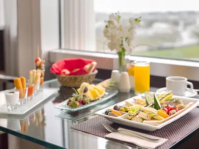a table with two trays of food on top at WOW Istanbul Hotel in Istanbul