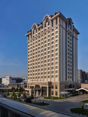 a large hotel building with a road in front of it at WOW Airport Hotel in Istanbul