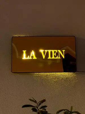 a neon sign that says la viren on a wall at La Vien Hotel Old City in Istanbul