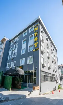 a building with a hotel sign on the side of it at Royal Nest in Istanbul