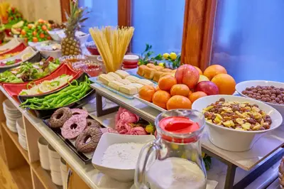 a buffet with different types of food on a table at Ardey Hotel in Istanbul