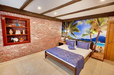 a bedroom with a bed in a brick wall at Ardey Hotel in Istanbul