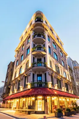 a large white building on the corner of a street at Hotel De Reve Galata-Special Class in Istanbul