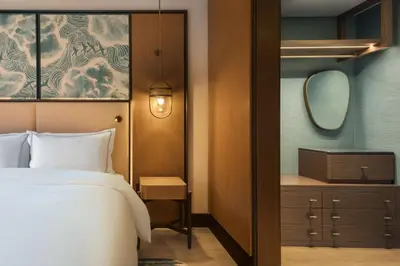 a hotel room with a bed and a mirror at The Westin Istanbul Nisantasi in Istanbul
