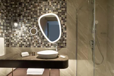 a bathroom with a sink and a mirror at The Westin Istanbul Nisantasi in Istanbul