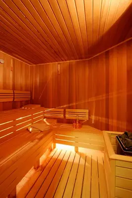 a empty room with wooden walls and wooden benches at Byotell Istanbul in Istanbul