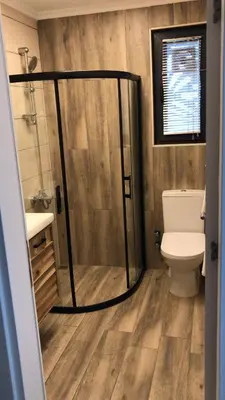 a bathroom with a shower and a toilet at ANTİGONİA BUTİK OTEL in İznik