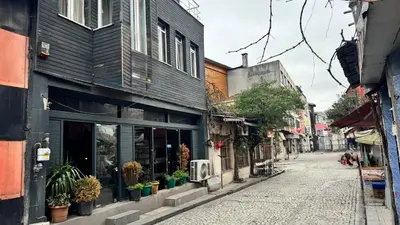 an empty street in an alley with a building at Herton Boutique Hotel in Istanbul