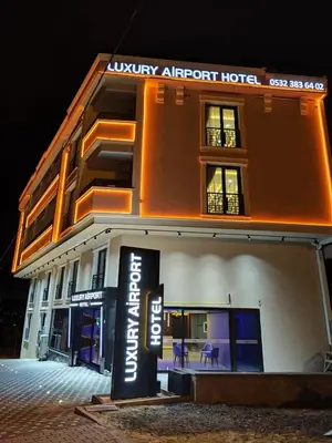 a hotel with a sign in front of it at Luxury Airport Hotel By Zazzoni-İstanbul Airport in Arnavutköy