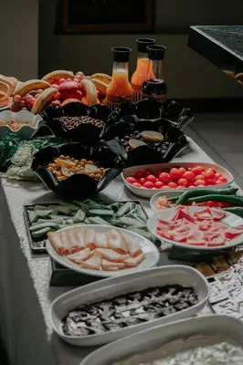 a table with many different types of food on it at Grand Quars Hotel in Avcılar