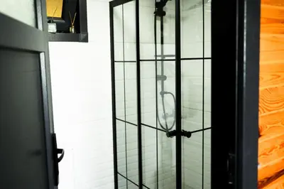 a bathroom with a glass door with a shower at LakeviewhouseSapanca in Sapanca