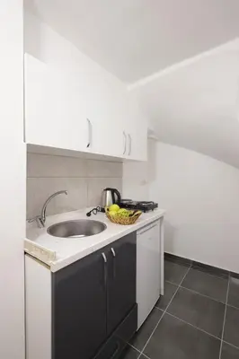 a kitchen with a sink and a counter top at Bonita Apart in Istanbul