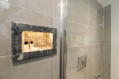 a bathroom with a shower with a sink at Azalea Mansion Oldcity in Istanbul