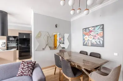 a dining room with a table and chairs at Central Istanbul, Luxury 3BR, 4 min to Metro in Istanbul