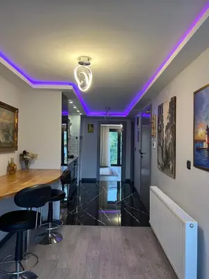a room with purple lights on the ceiling at Ortakoy Suit in Istanbul