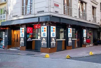 a building with signs on the side of a street at Lavin Hotel & Suites in Istanbul