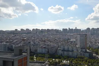 a view of a city with tall buildings at Two Bedroom King Suite TH30 in Esenyurt