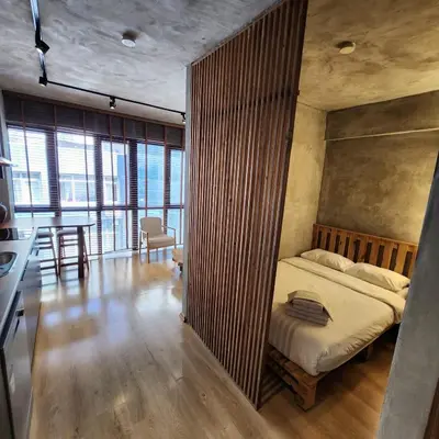 a bedroom with a bed and a table in a room at BlokNoi in Istanbul
