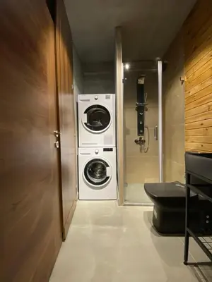 a laundry room with a washer and dryer in it at BlokNoi in Istanbul